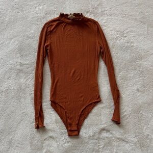 Rust Long Sleeve Bodysuit